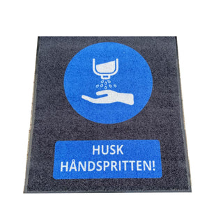 Smudsmåtte med tekst | Husk håndsprit